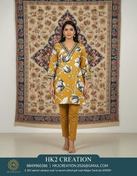 V-NECKLINE WITH CONTRASTING EMBROIDERY