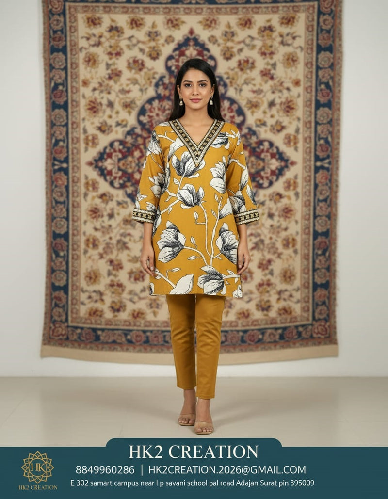 V-NECKLINE WITH CONTRASTING EMBROIDERY