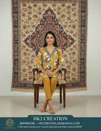 V-NECKLINE WITH CONTRASTING EMBROIDERY